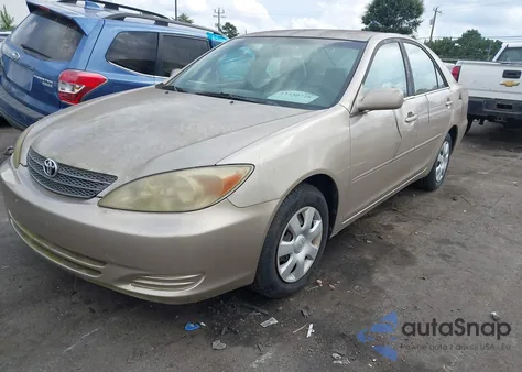 2004 Toyota Camry Le z USA, uszkodzony, nr VIN 4T1BE32K04U264646